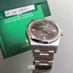 ROLEX Oyster Perpetual 39 mm 114300 Rhodium Dial